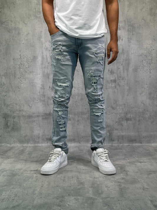 That Guy Ripped & Tapered Denim Jeans